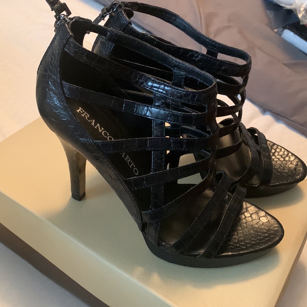 Gently used Franco Sarto leather cage pumps.